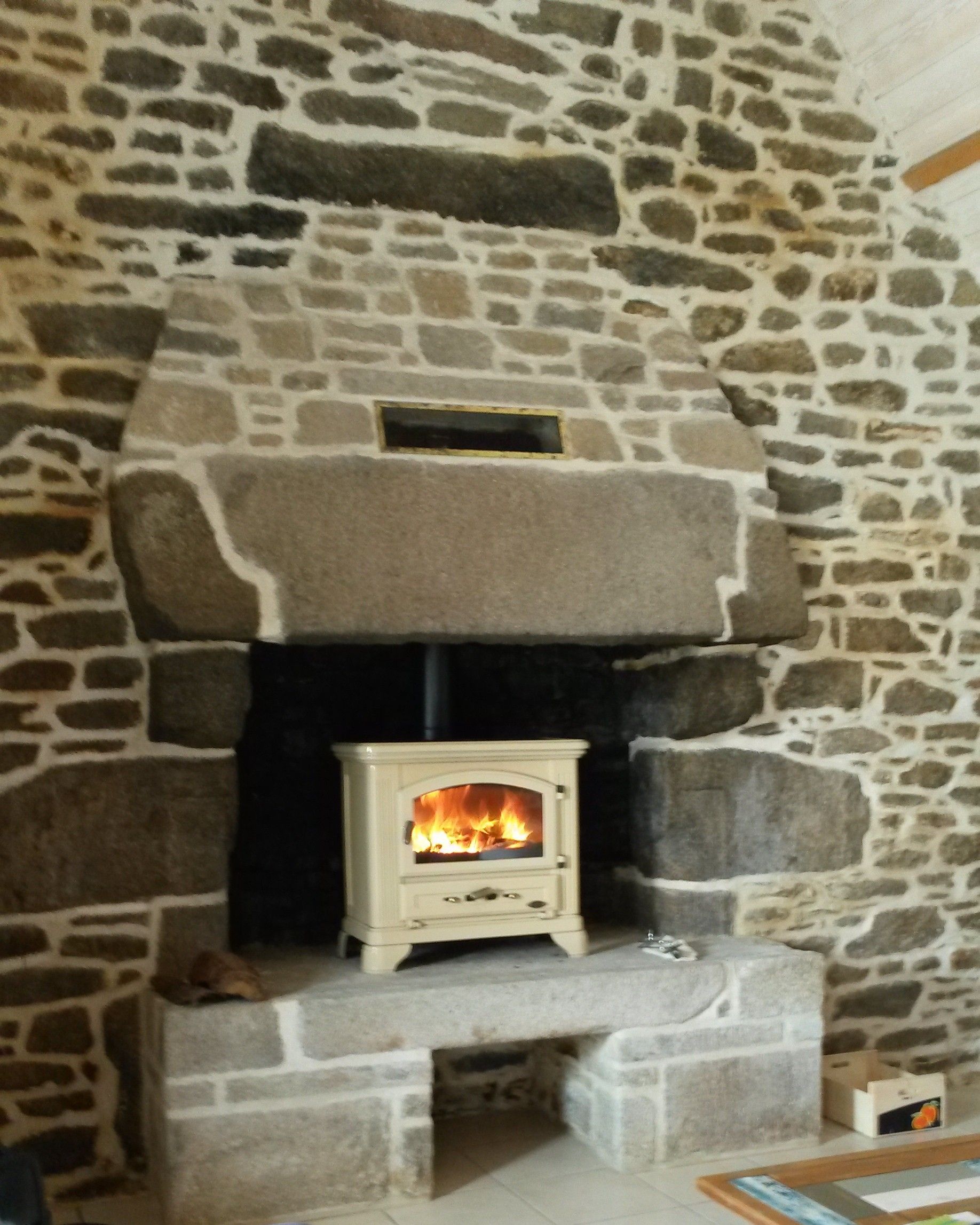 Pose d'un insert bois dans une cheminée